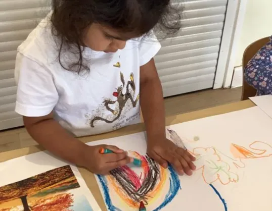 Child drawing at Kiddi Caru Taunton