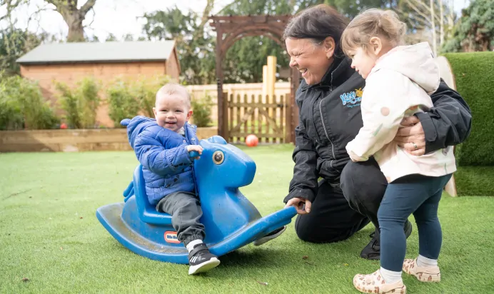 Child on rocking horse at The Melton Mowbray Day Nursery Preschool Leicester