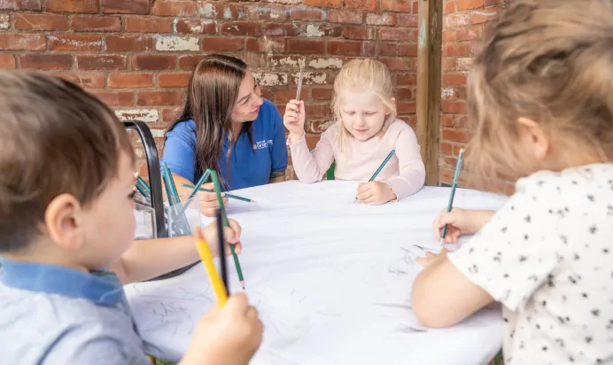 Children drawing at The Old Barn Day Nursery Preschool Narborough