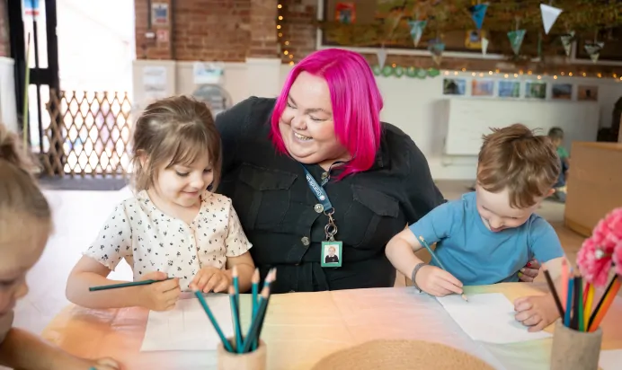 Children drawing together at The Old Barn Day Nursery Preschool Narborough