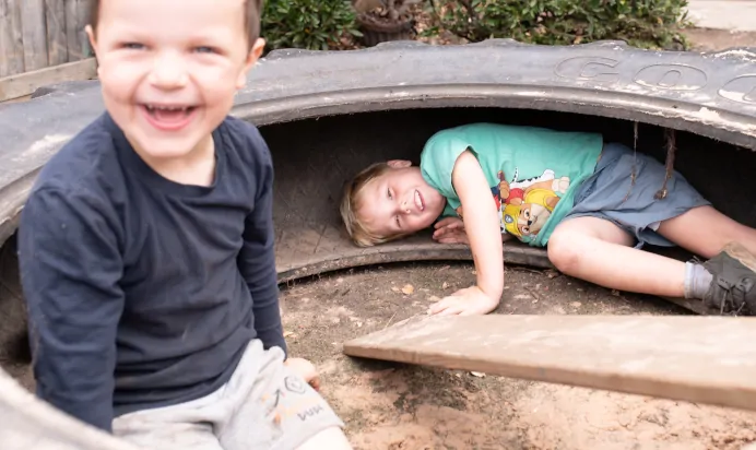 Children laughing and playing at The Kiddi Caru Day Nursery Preschool Writtle