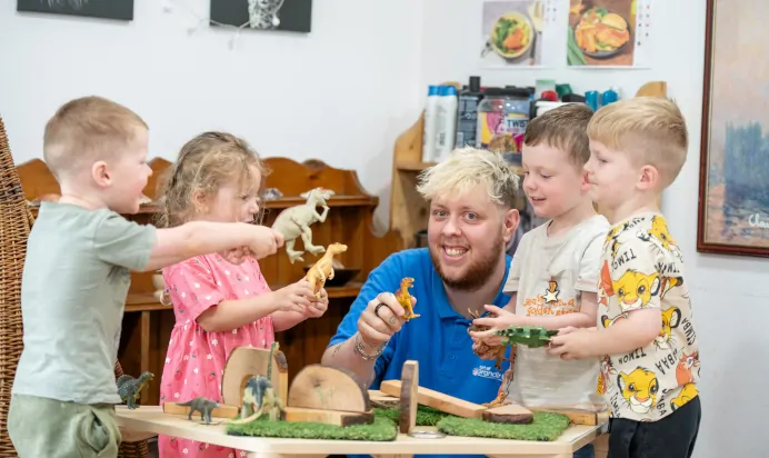 Children playing together in interactive space at The Kiddi Caru Day Nursery Preschool Burgess Hill