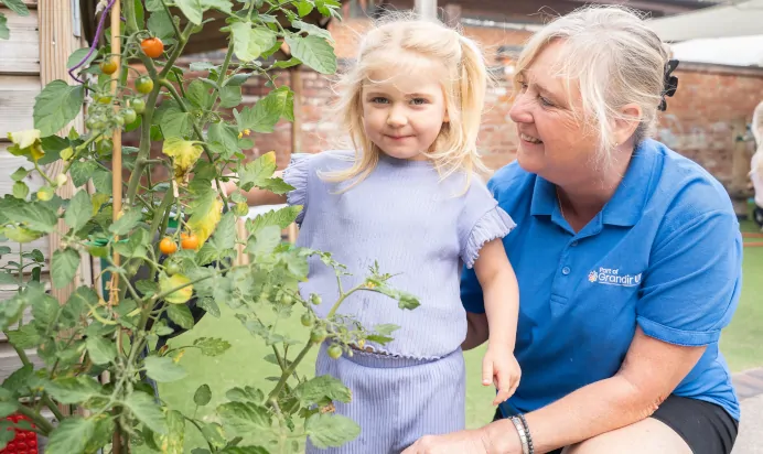 Key worker supporting child at The Old Barn Day Nursery Preschool Narborough