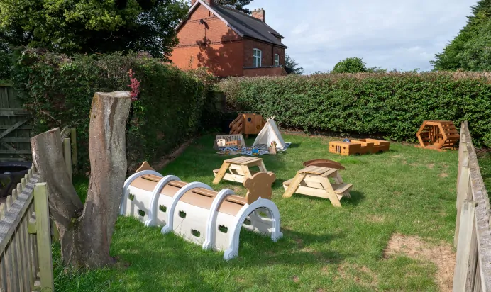 Outdoor playground area for small children at The Laurels Day Nursery Preschool Queniborough