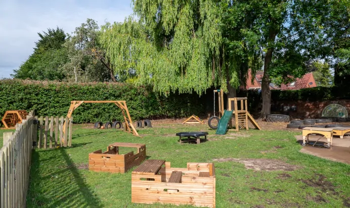 Outdoor playground equipment at The Laurels Day Nursery Preschool Queniborough
