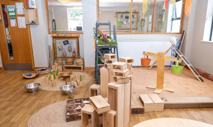 Indoor play area with large sand pit at Dicky Birds Nursery Preschool Raynes Park London