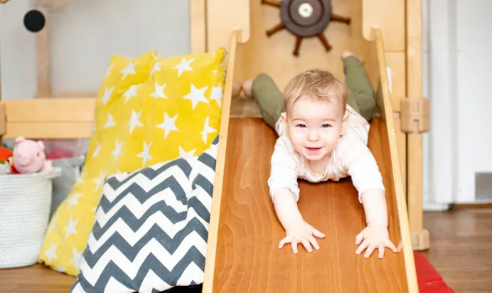 Child in bright interactive space at Radcliffe On Trent Day Nursery Preschool