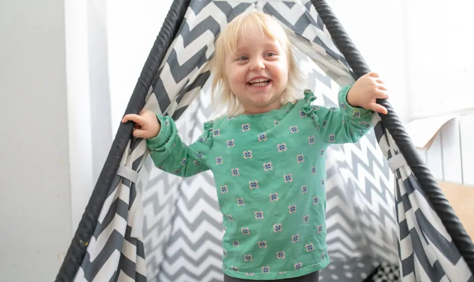 Child smiling at The Penge East Day Nursery Preschool London