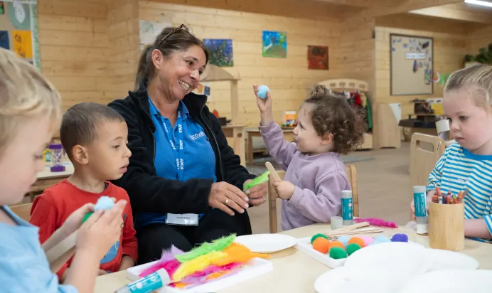 Children creating art together at The Chingford Forest Day Nursery Preschool London