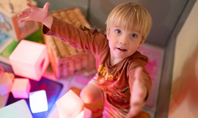Children playing together in interactive space at The Kensington Place Nursery Preschool London