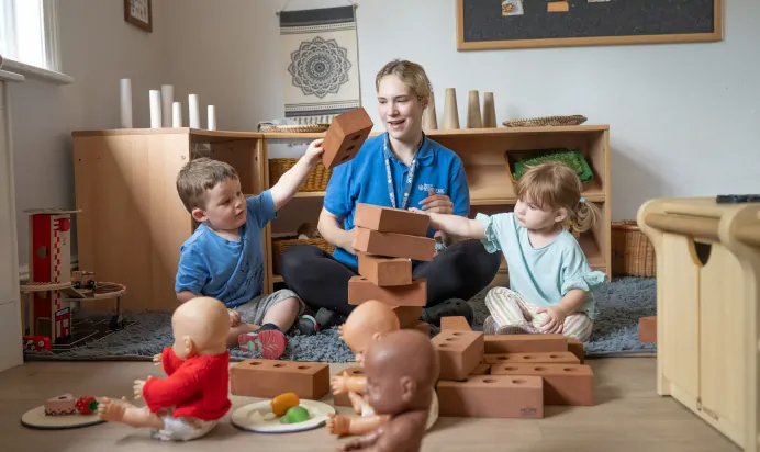 Children playing with foam bricks at The Daydream Nursery Preschool Woking
