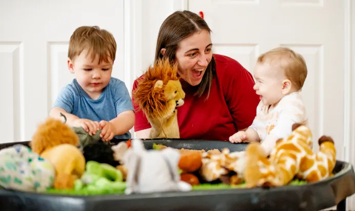 Children playing with key worker at Radcliffe On Trent Day Nursery Preschool