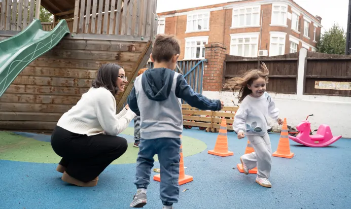 Children running around cones at The Winchmore Hill Day Nursery London