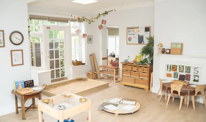 Indoor play area with books at The Daydream Nursery Preschool Woking