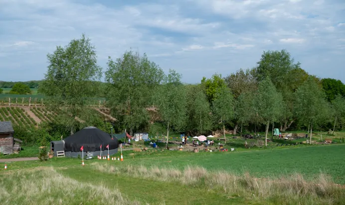 Large outdoor area with climbing frames and toys at Pippins Montessori Day Nursery Forest School Colchester