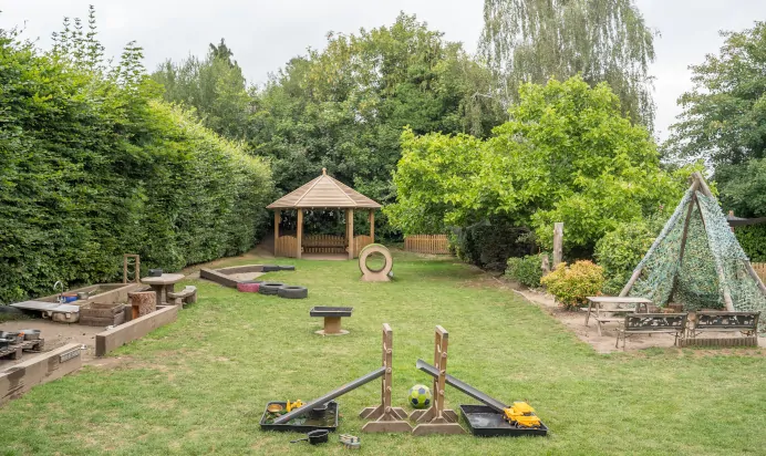 Outdoor garden area at The Daydream Nursery Preschool Woking