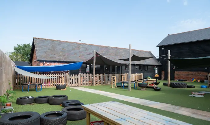 Outdoor play area at Pippins Montessori Day Nursery Forest School Colchester