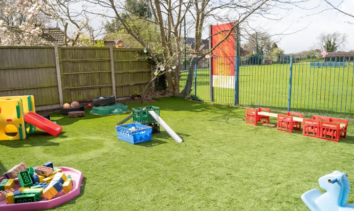 Outside space with slide at The Ryan House Day Nursery Preschool Nottingham