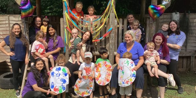 The children and team at Kiddi Caru Day Nursery in Park Gate, Fareham celebrating their Ofsted ‘Good’ rating.