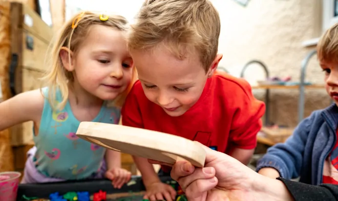 Children and wooden toys at Lake House Day Nursery Preschool Westbury On Trym Bristol