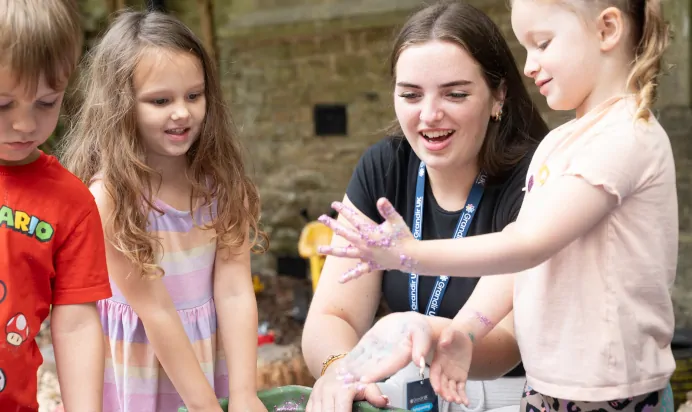 Child having fun with key worker at The Puddleduck Preschool Priory Road Ascot