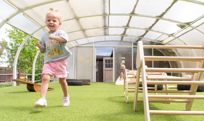 Child smiling at The College Town Montessori Nursery Preschool Sandhurst