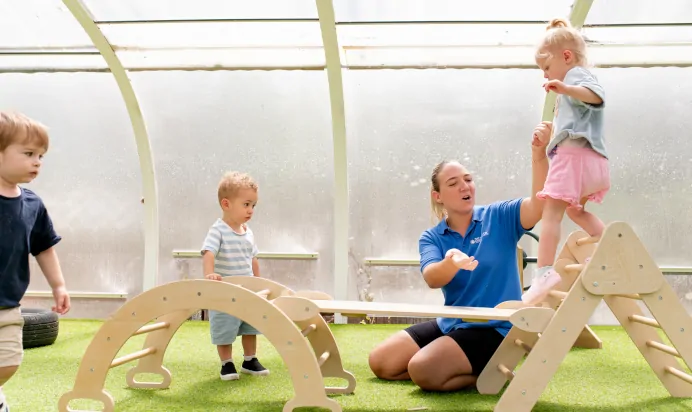 Key worker with child at The College Town Montessori Nursery Preschool Sandhurst