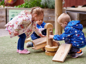 Children playing outdoors at pre school