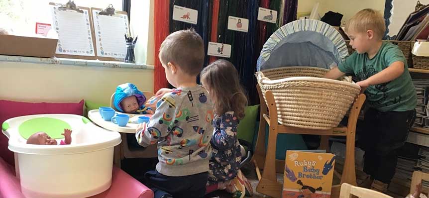 Kiddi Caru Whiteley Care for their Baby Dolls