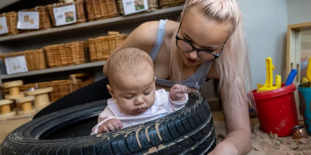 Woman and her child at a nursery