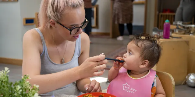 Baby having lunch at the nursery