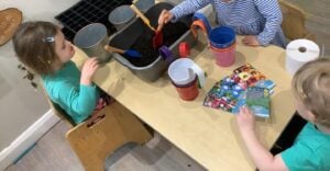 The children at Dicky Birds Day Nursery & Preschool on Pelham Road, Wimbledon taking part in their Sow & Grow activity. 